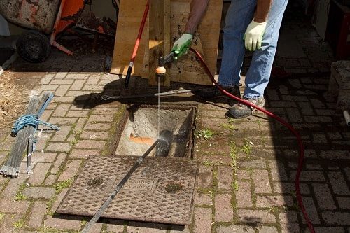 using water jet on a drain