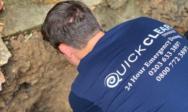 Digging out blocked drains at London Property